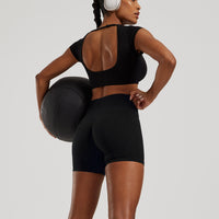 Motion Seamless Open Back Short Sleeve Crop Top | Black